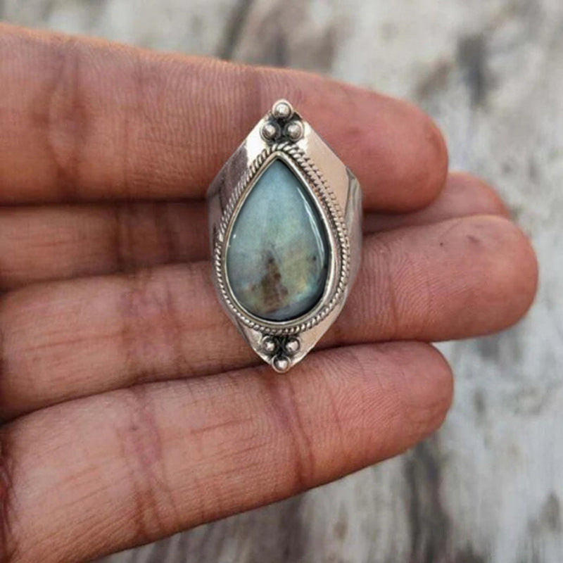Ring With Teardrop Sticker To Resemble Natural Stone